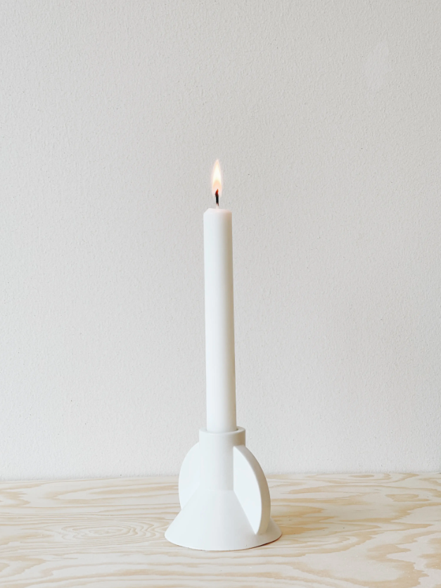 white concrete taper candlestick holder