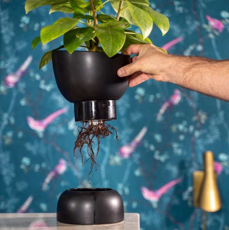 black ceramic self watering planter pot