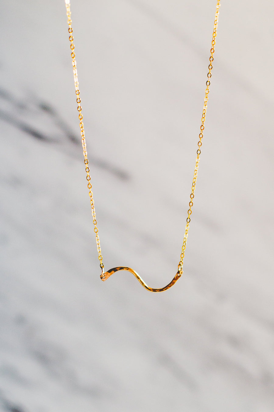 wave gold necklace